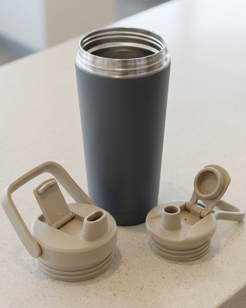 Mvabv Twenty Two Ounce Travel Tumbler with Flip Chug Spout and Carry Bail Slate - Lifestyle view